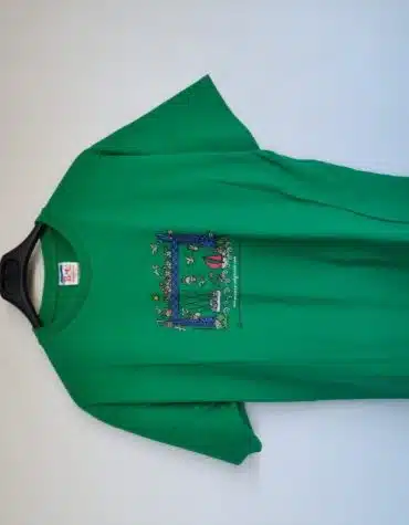 Kukuxumusu. Camiseta manga
corta verde con dibujos